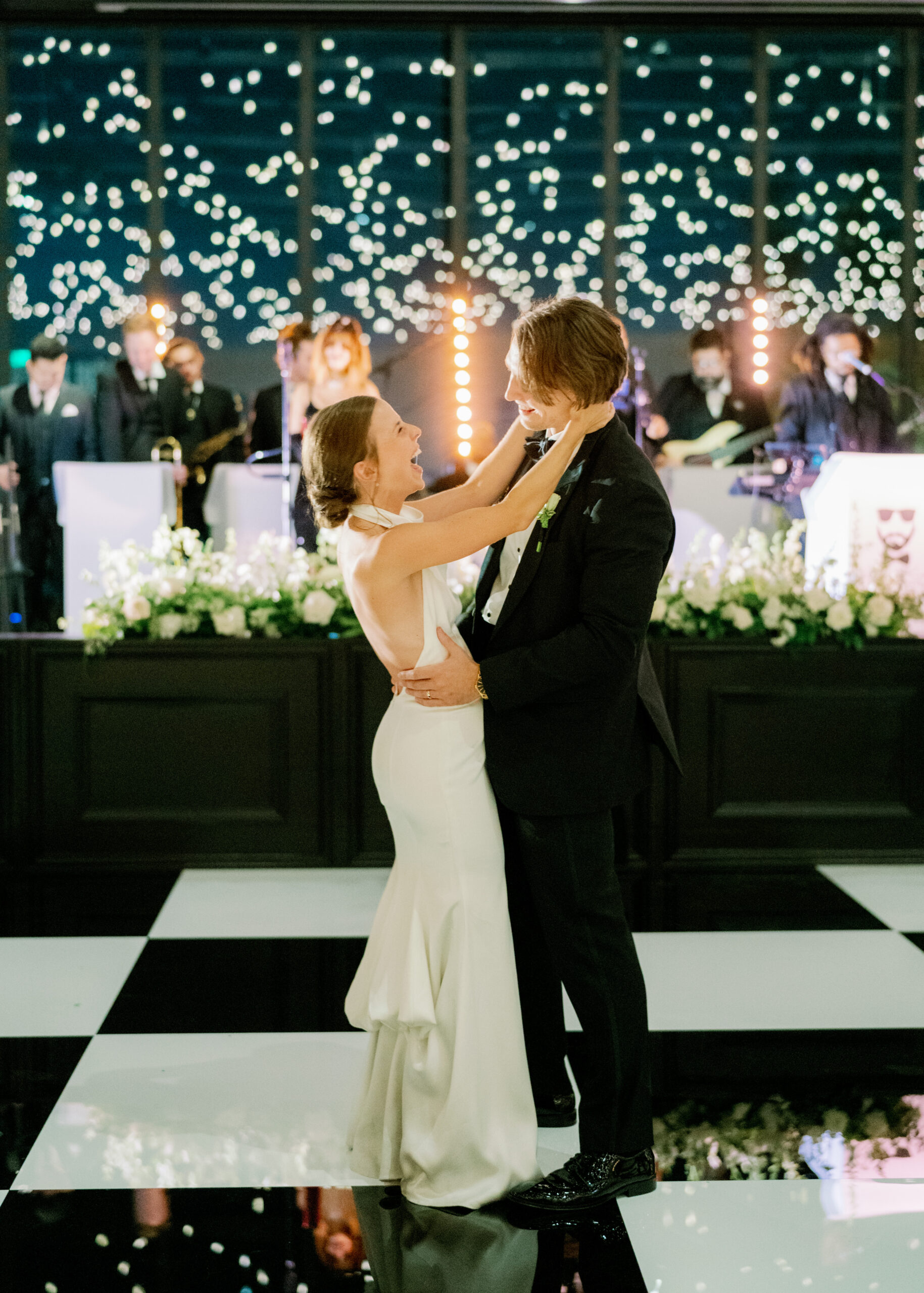 A bride and groom share their first dance at their wedding.