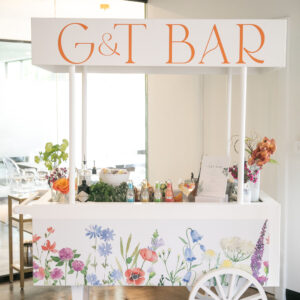 Flower cart bar install with flowers from Render Event Co.