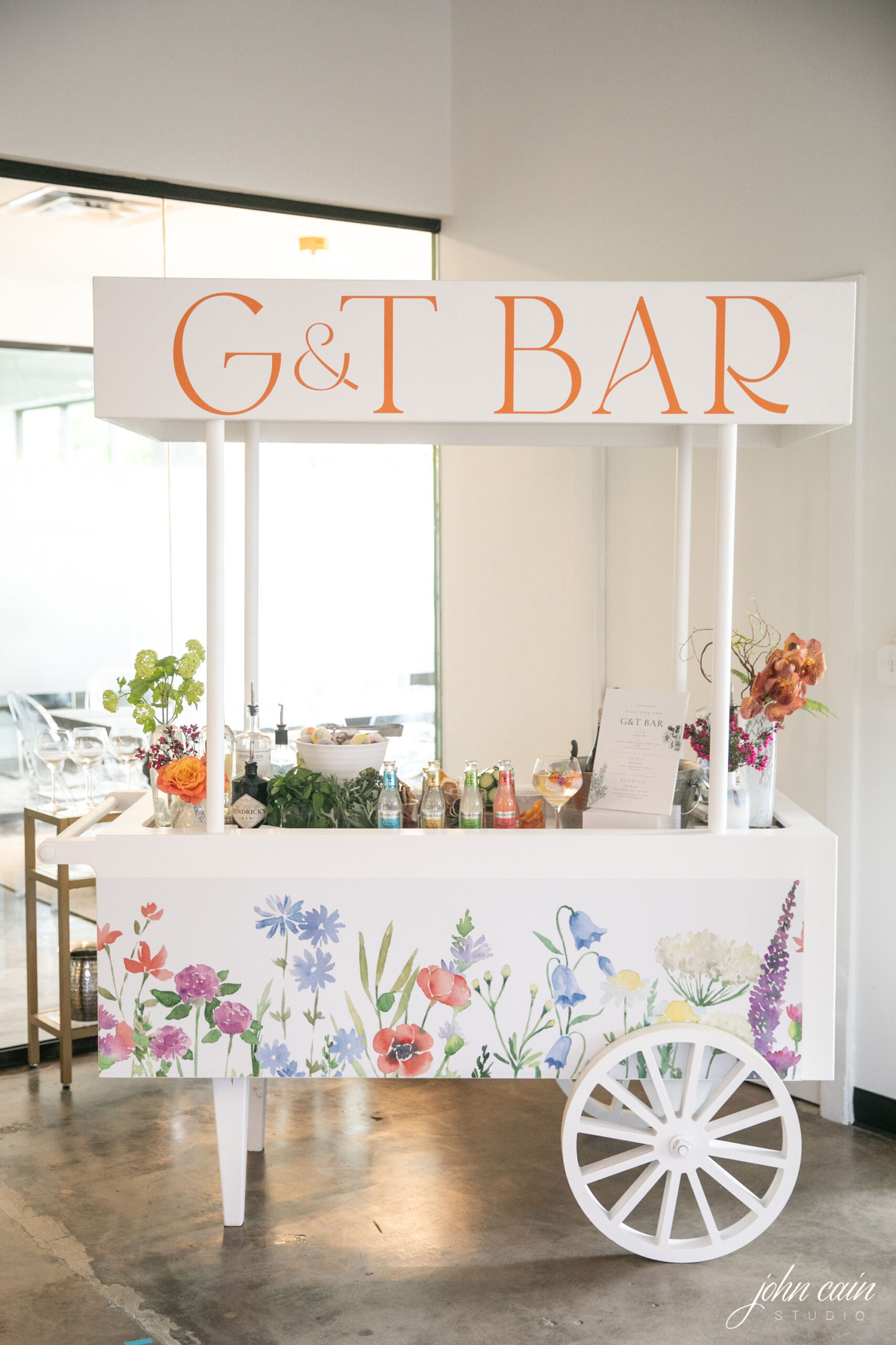 Flower cart bar install with flowers from Render Event Co.