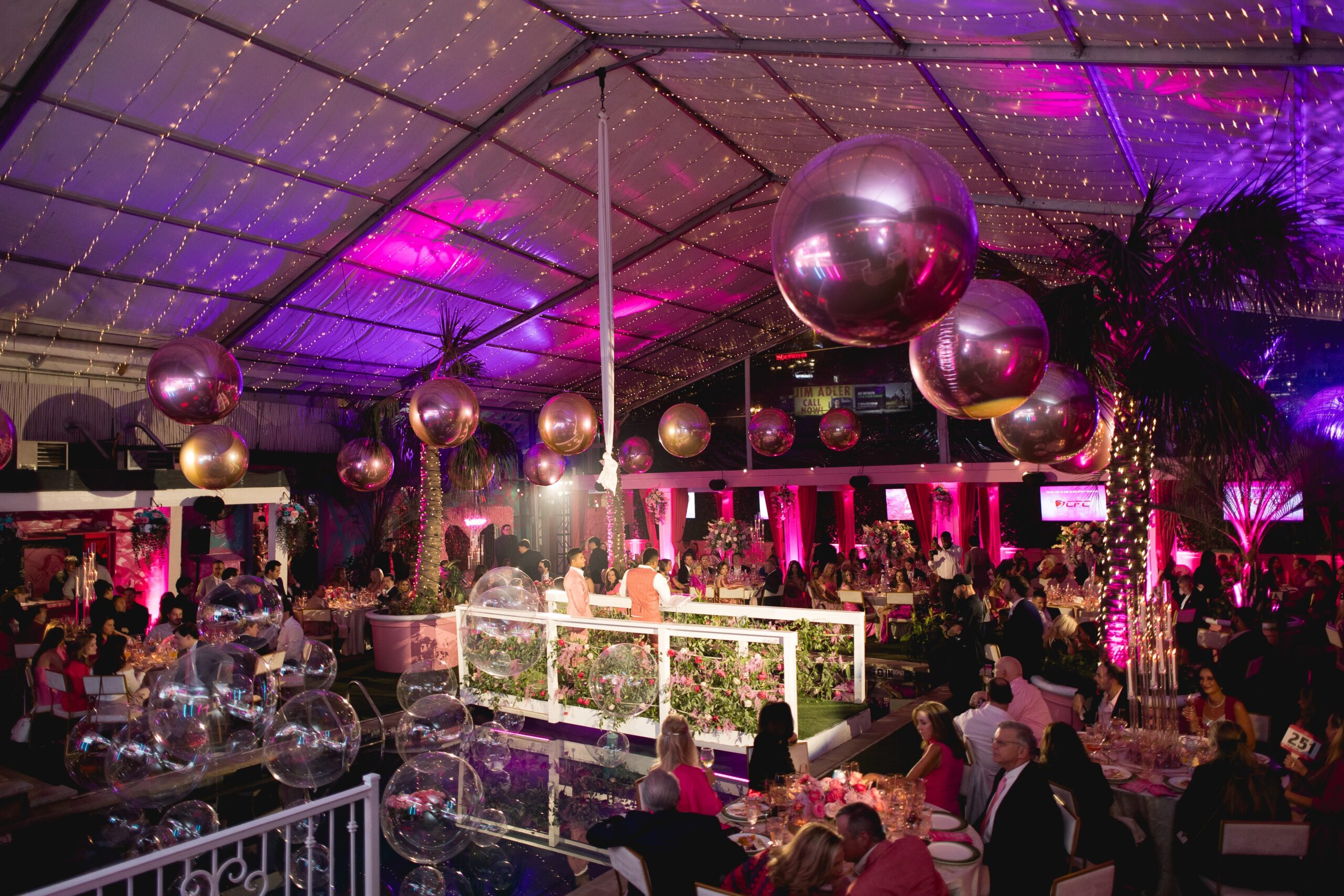 Pink Party in Dallas, Texas with Render Event Co. rentals creating a show-stopping pink stage.