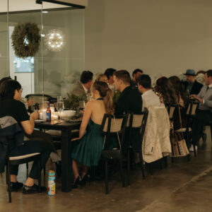 Corporate team Christmas party with dinner and drinks.