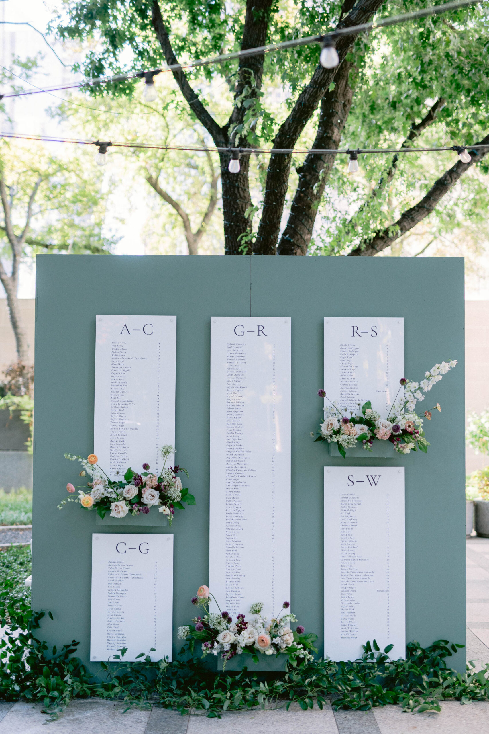 Custom seating chart, with florals, rented for a Dallas wedding.